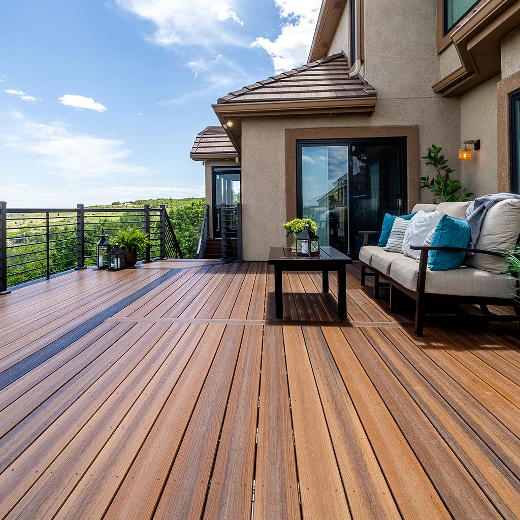 Envision Distinction composite deck behind a stucco home