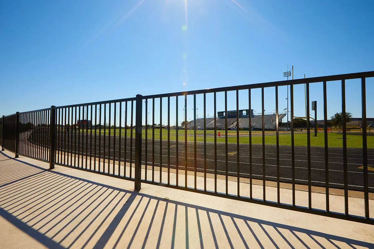 Fortress steel fence beside an athletic field
