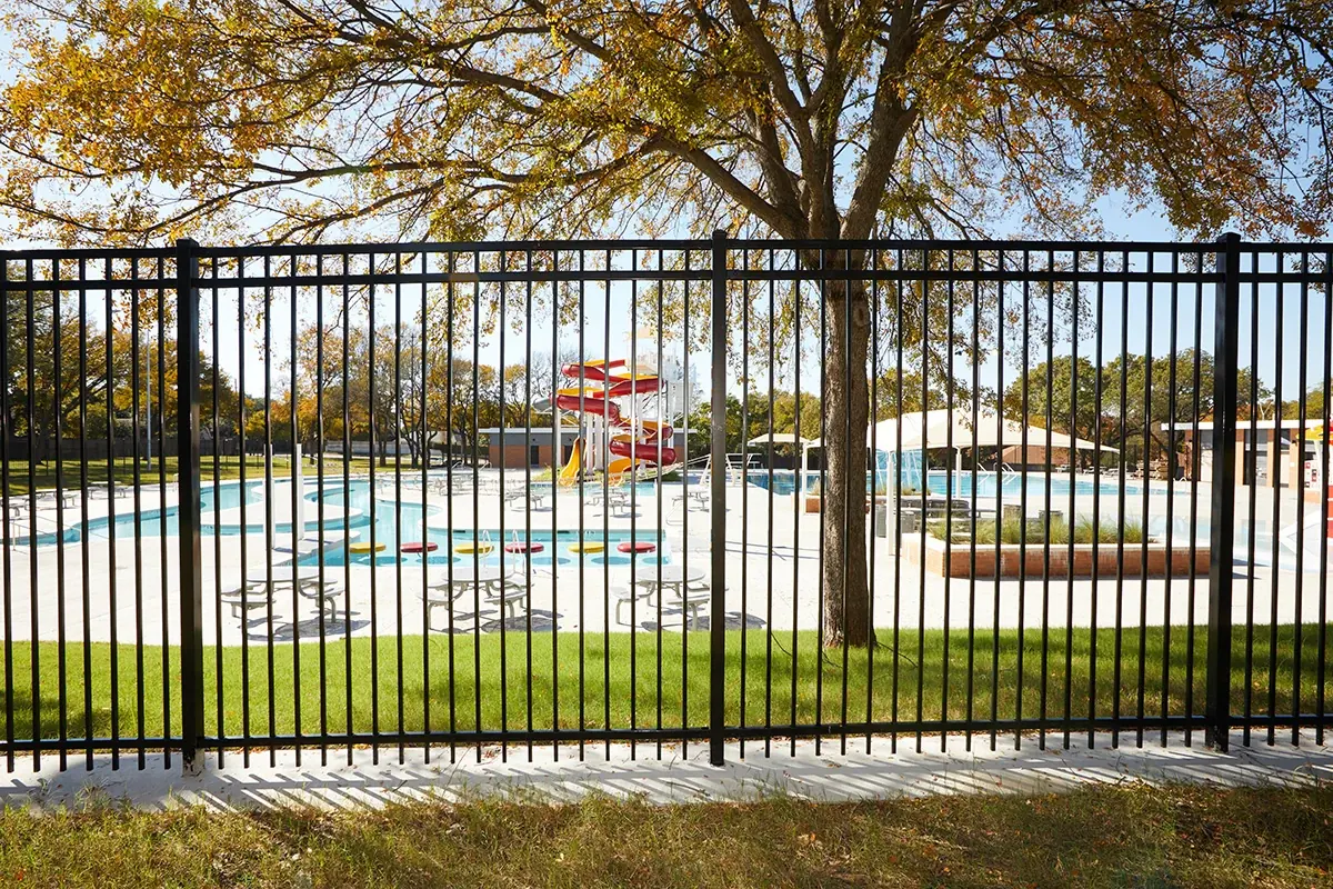 Fortress steel fence around a community pool