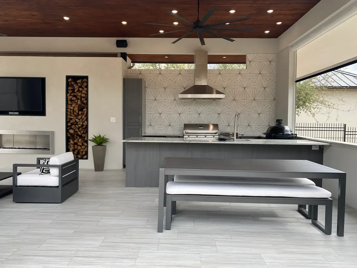 Modern covered outdoor kitchen with gray WeatherStrong cabinets