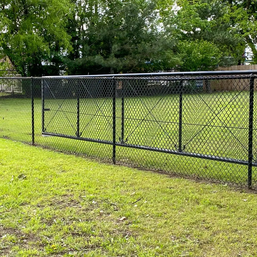 Chain link fence framework - color-coated chain link fence installed, Ameristar