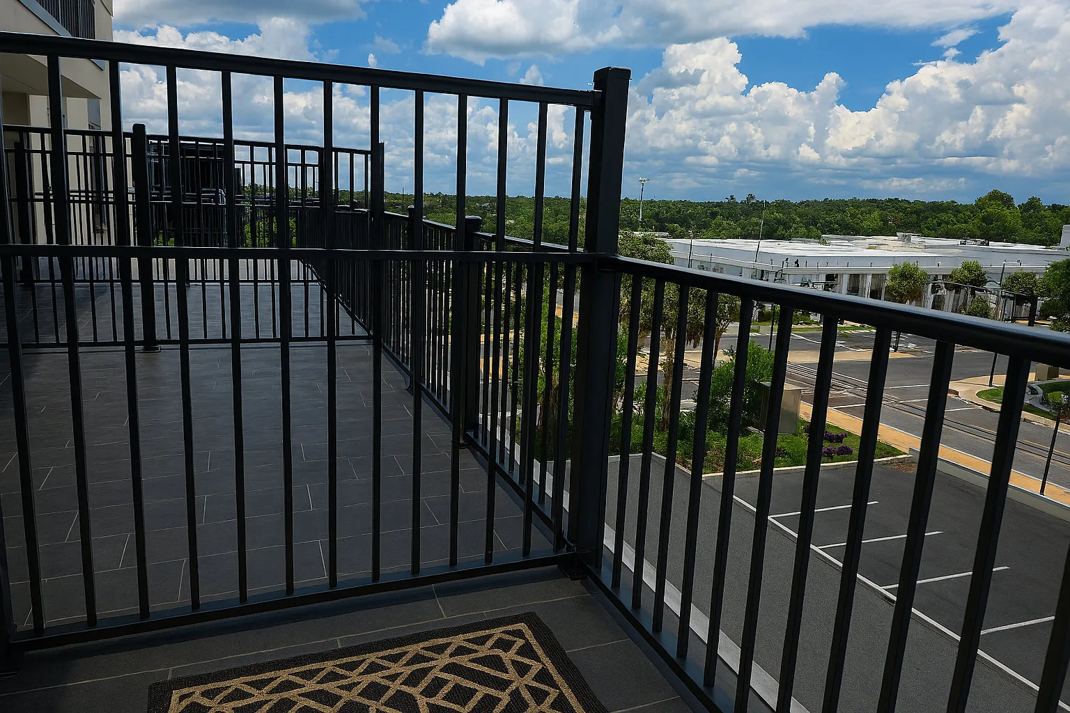Black aluminum railing at a parking deck overlook