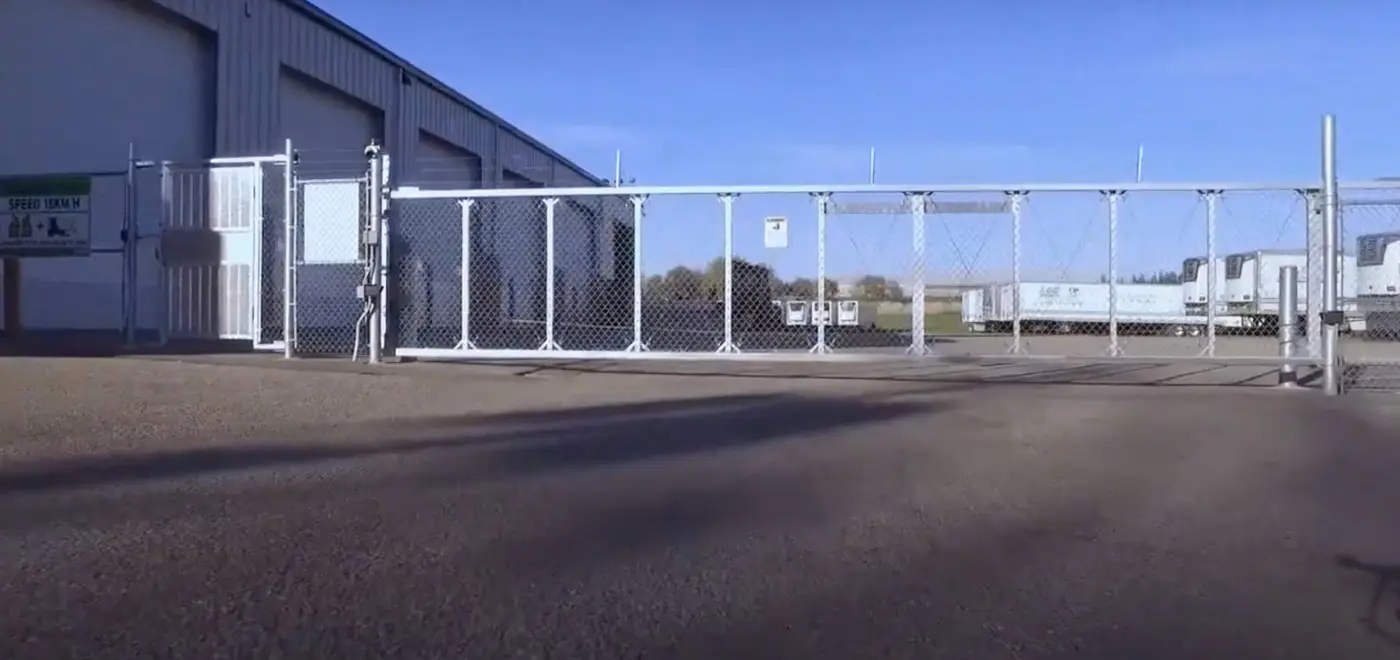 Commercial chain-link gate - cantilever slide gate installed at a commercial site, ARMA Gate