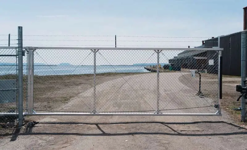 Commercial chain-link gate - chain link slide gate installed, ARMA Gate
