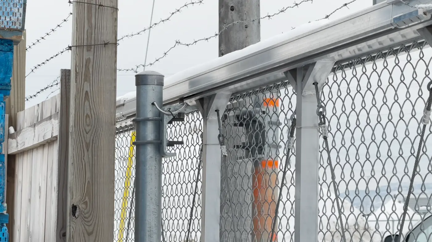 Chain link fittings and hardware - chain link fabric and fittings at a post, ARMA Gate