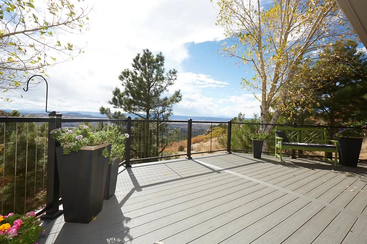 Stainless cable railing on a deck overlooking a golf course