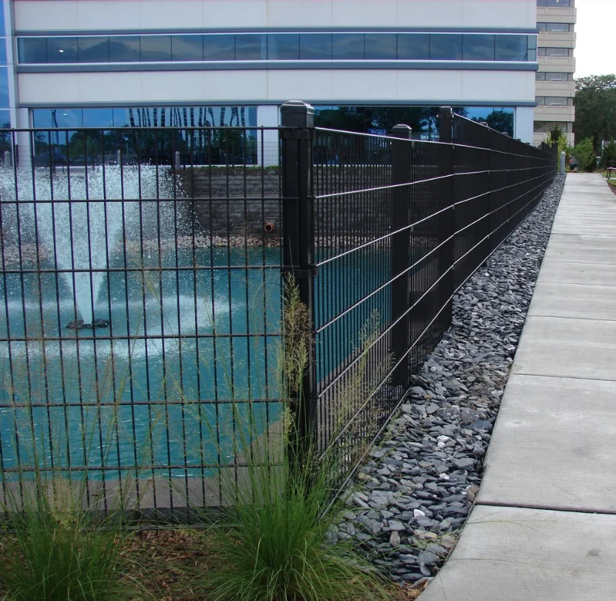 Betafence Double Wire 868 welded wire fence beside a water feature