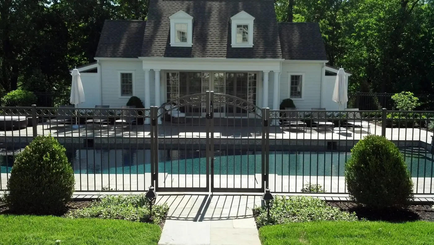 Catalyst aluminum gate and fence around a pool house
