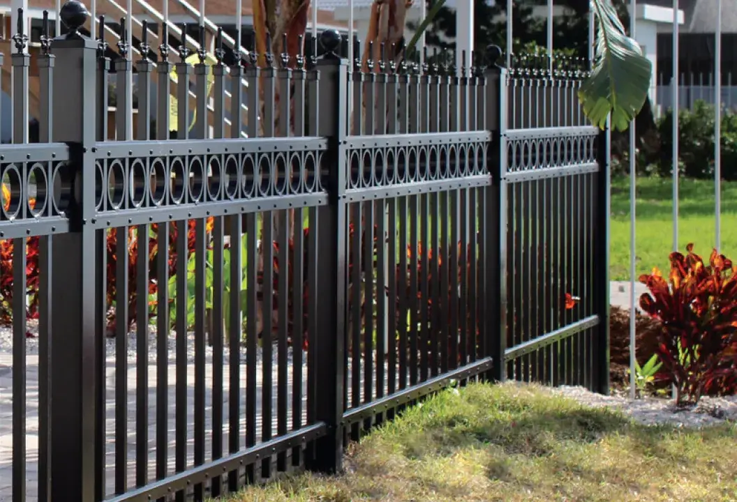 Catalyst black aluminum picket fence with decorative rings for commercial property