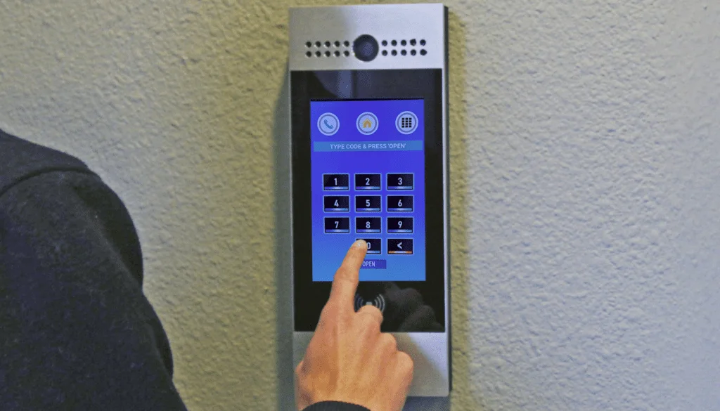 CellGate Watchman W461 touchscreen video intercom in use