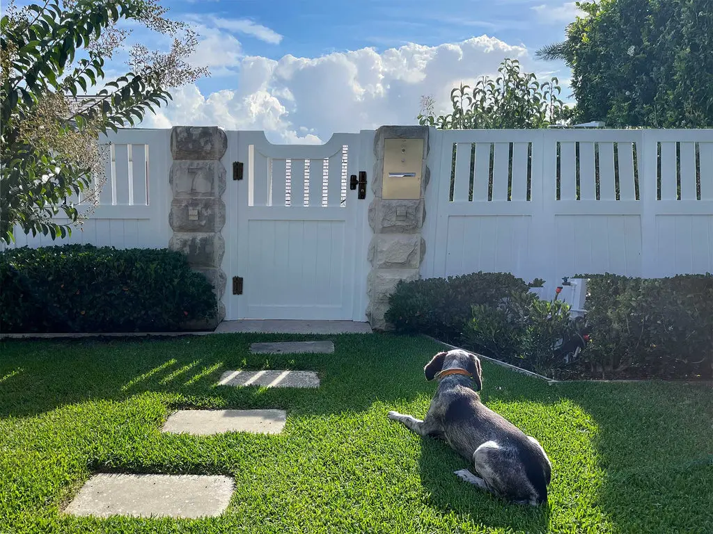 Dog-friendly vinyl gate fitted with D&D KwikFit hinge hardware