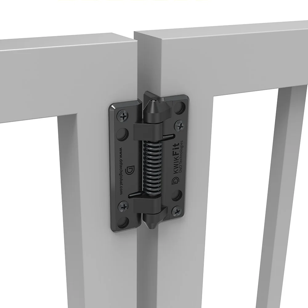 KwikFit polymer self-closing gate hinge on a white vinyl gate