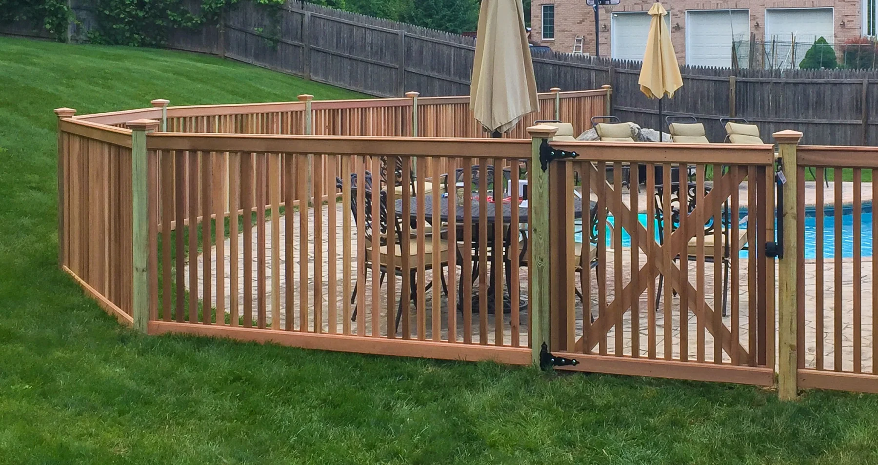 Eastern Wood Fence picket gate in a pool fence