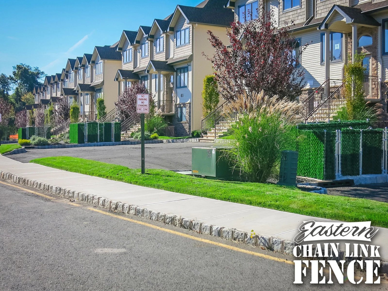 4 ft chain-link fence with privacy hedge