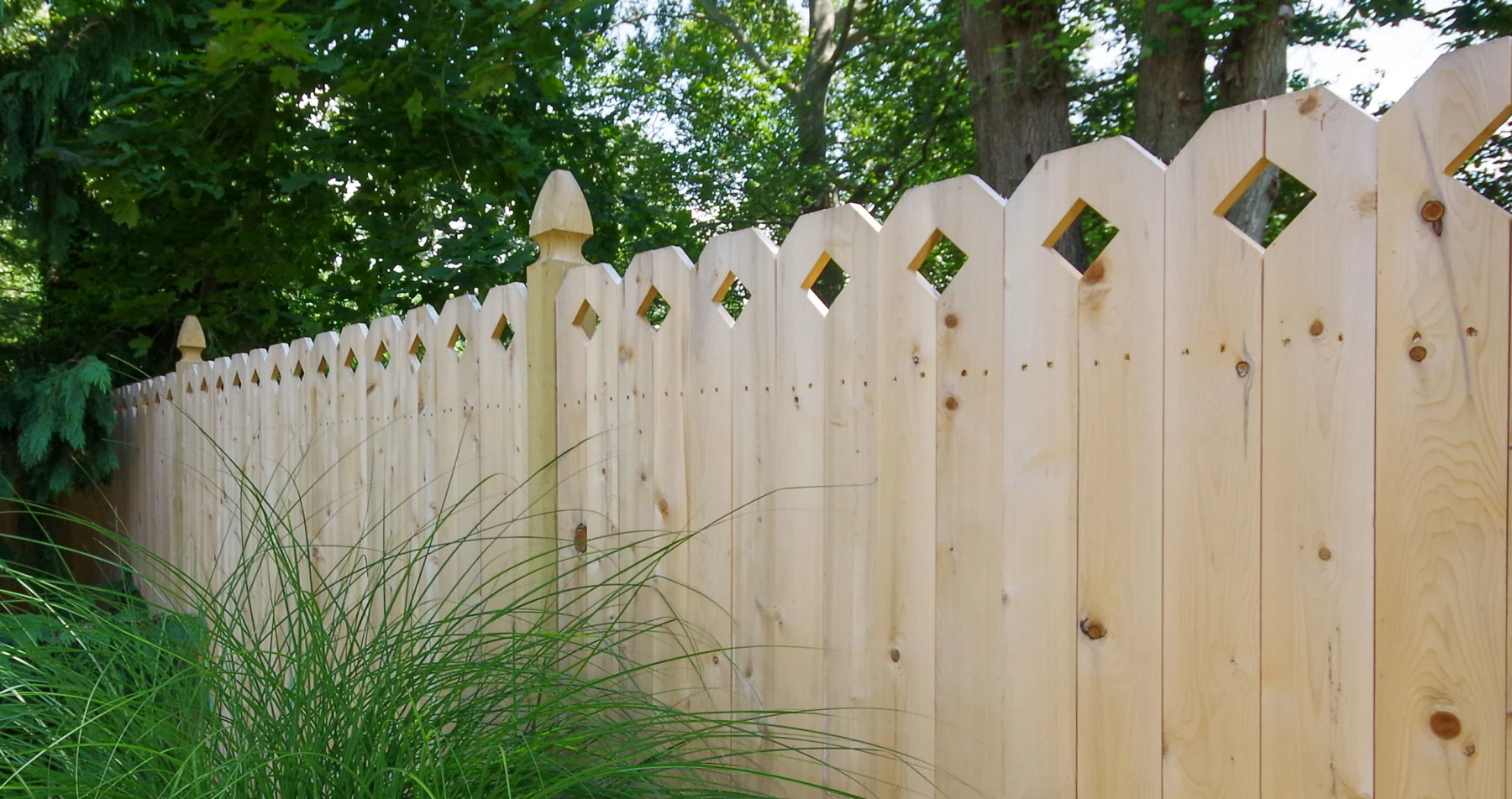 Eastern Wood Fence solid shaped panels with diamond cutouts