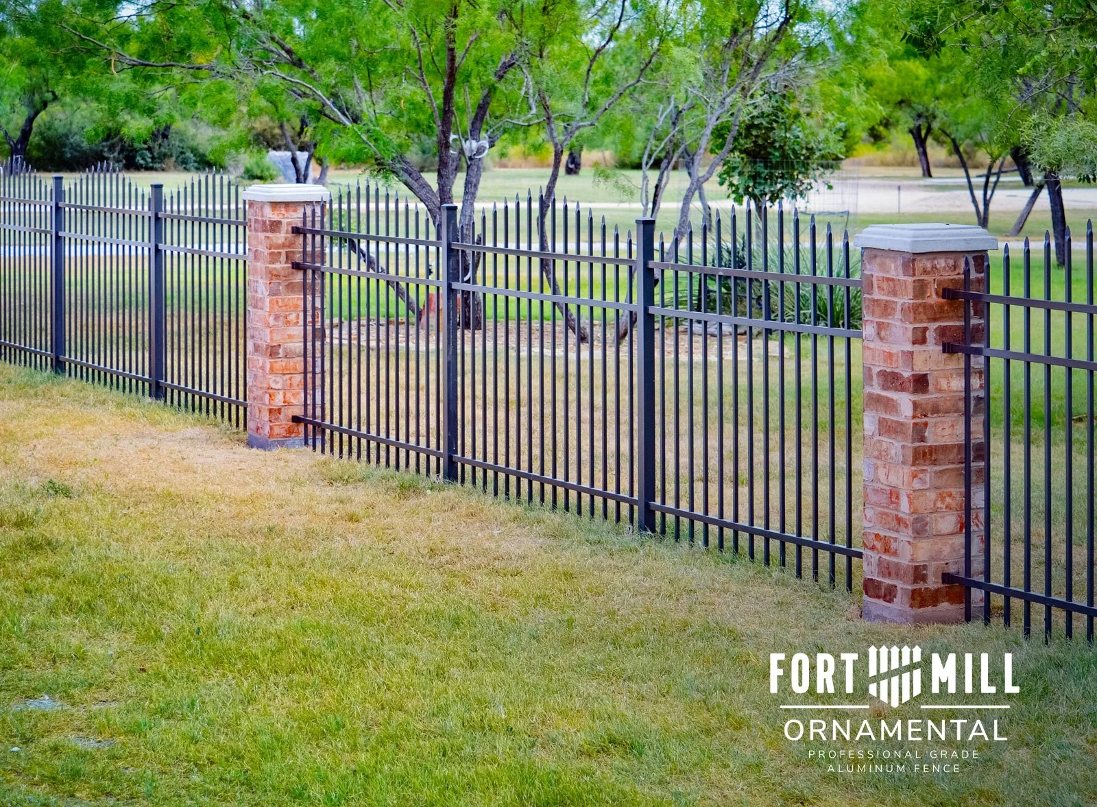 Fort Mill Ornamental Fairview style fence between brick columns