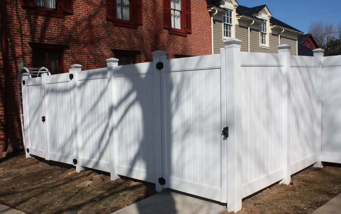 Envision vinyl privacy fence with matching gate