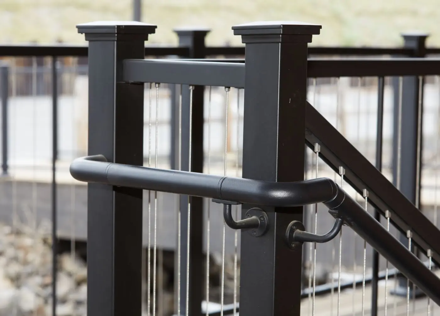 Fortress black handrail system on a stair railing