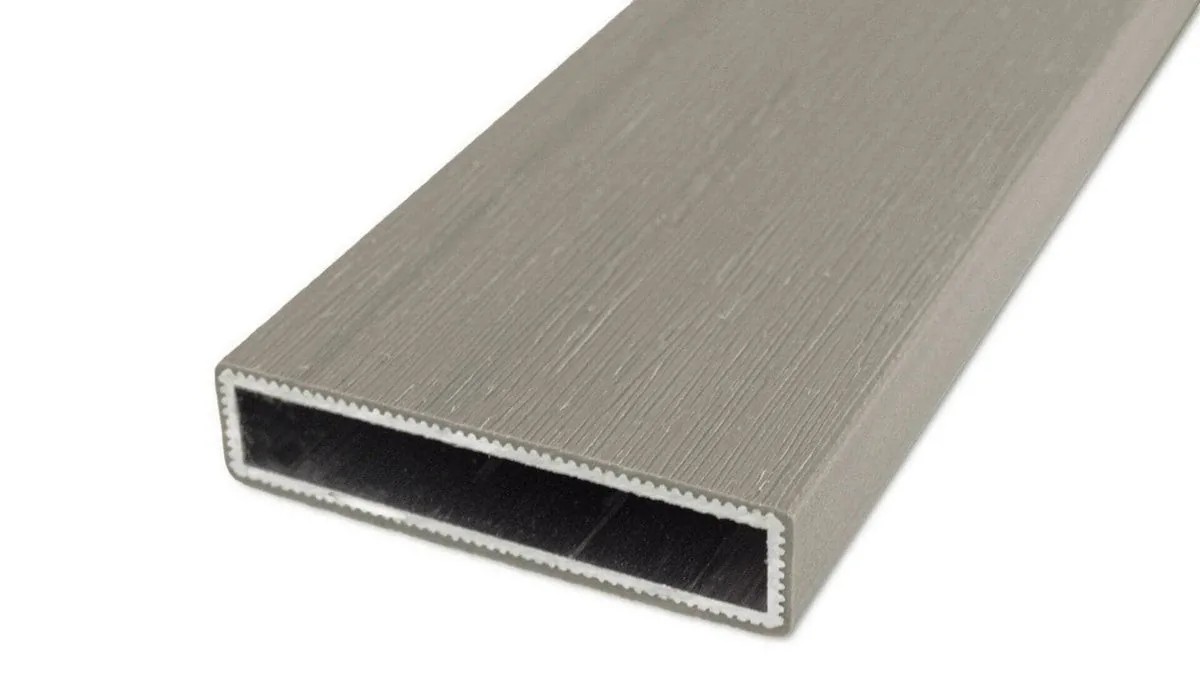Cap Coat aluminum fence rail in a gray-beige wood-grain finish