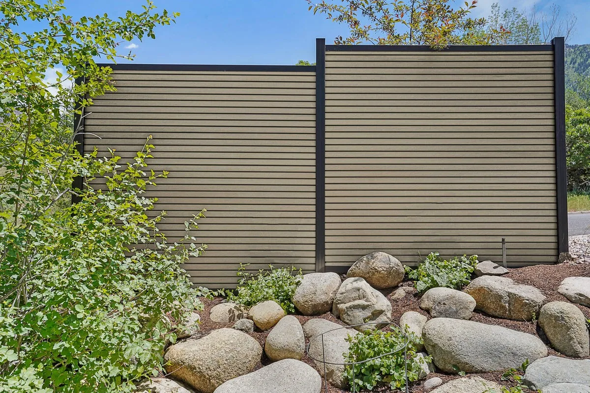 Riviera composite privacy fence panels in a river birch color