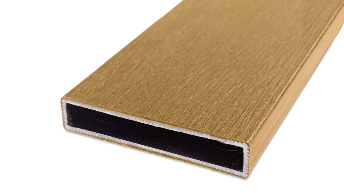 Cap Coat aluminum fence rail in a golden wood-grain finish