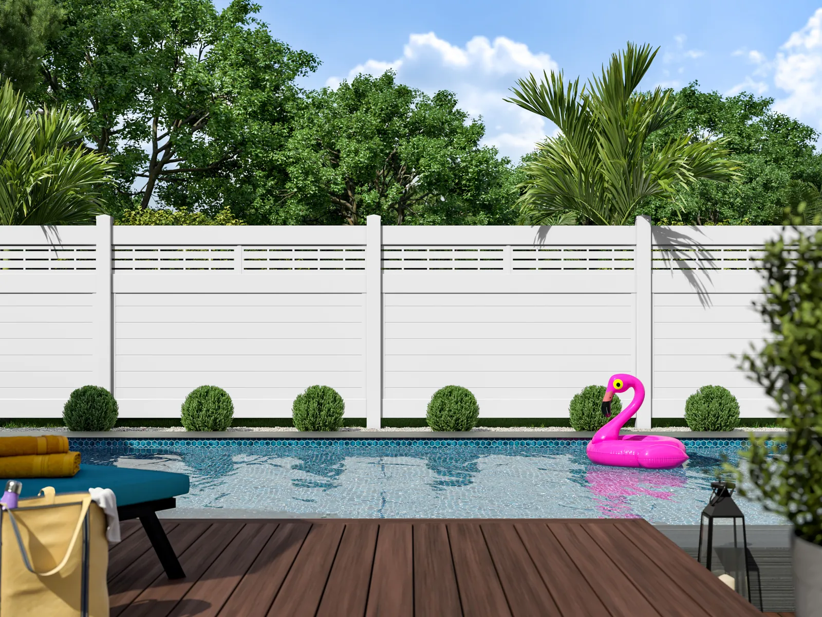 White vinyl privacy fence around a pool