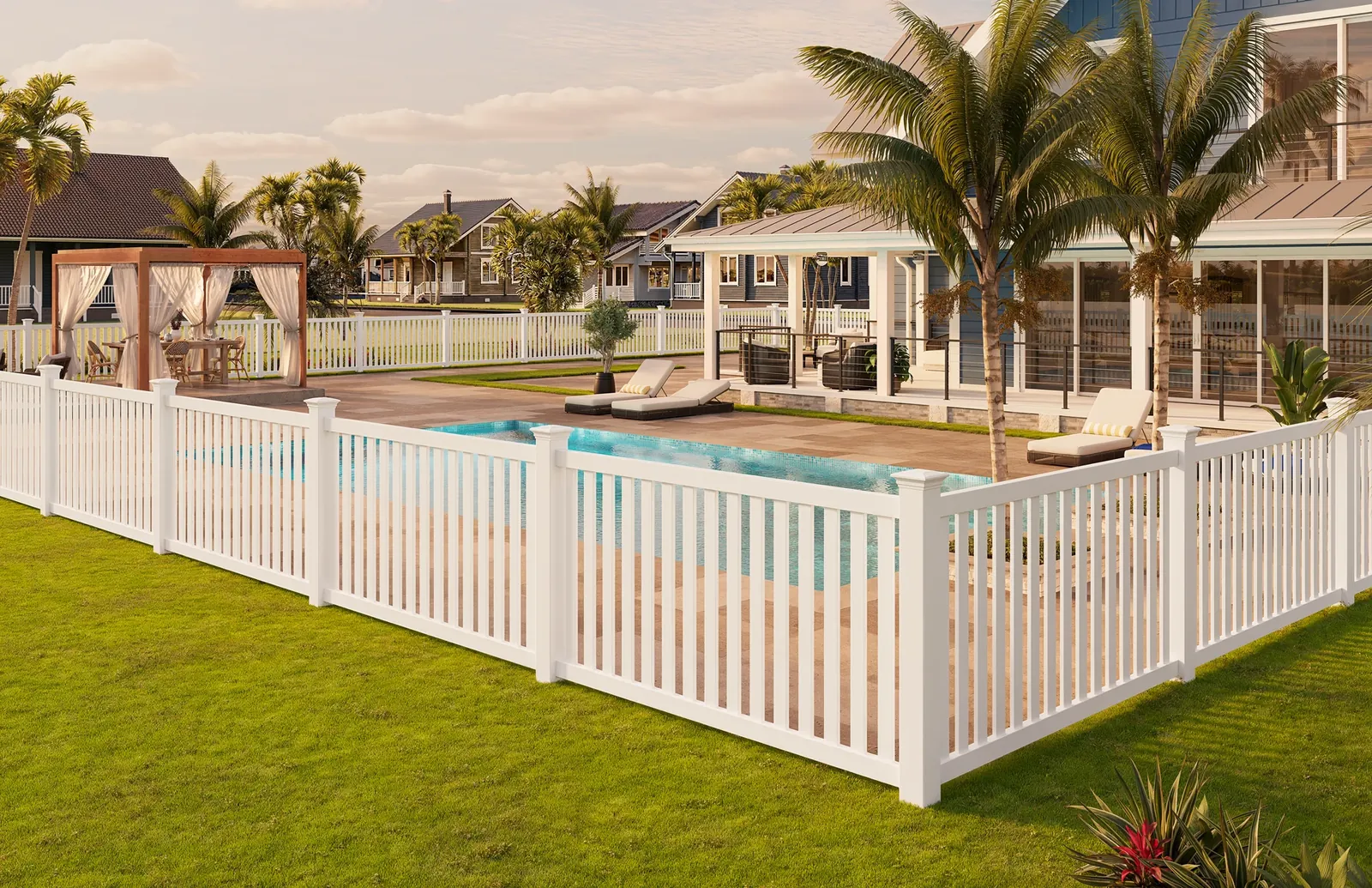 White vinyl pool fence with palms