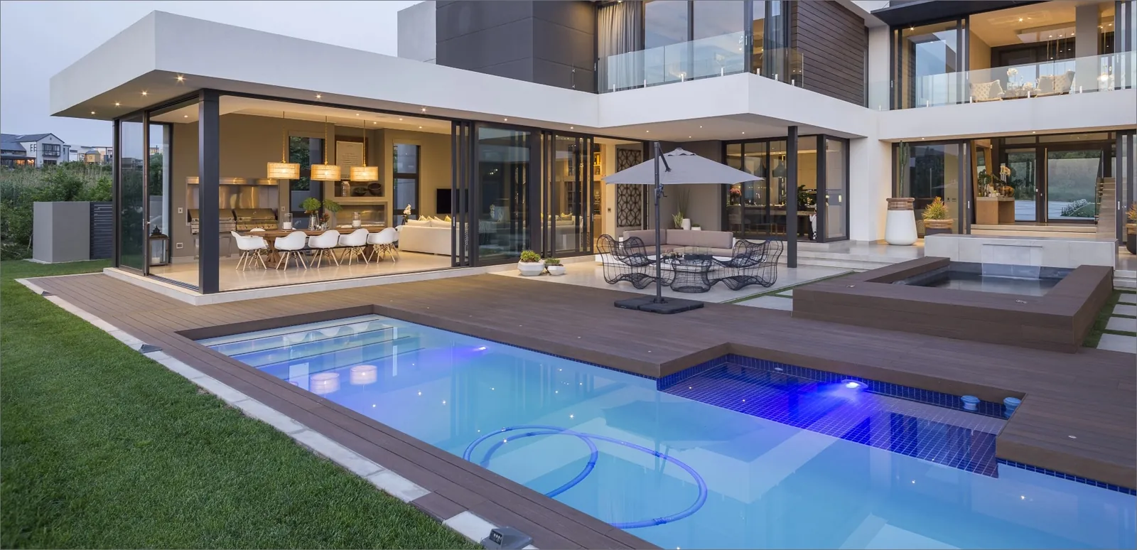 Modern pool terrace with outdoor dining