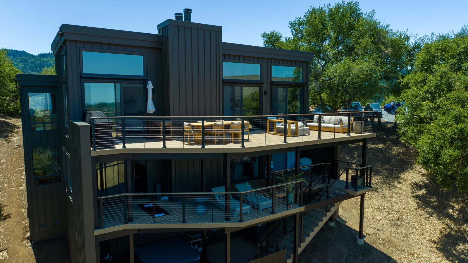 Multi-story steel-framed deck on a modern home