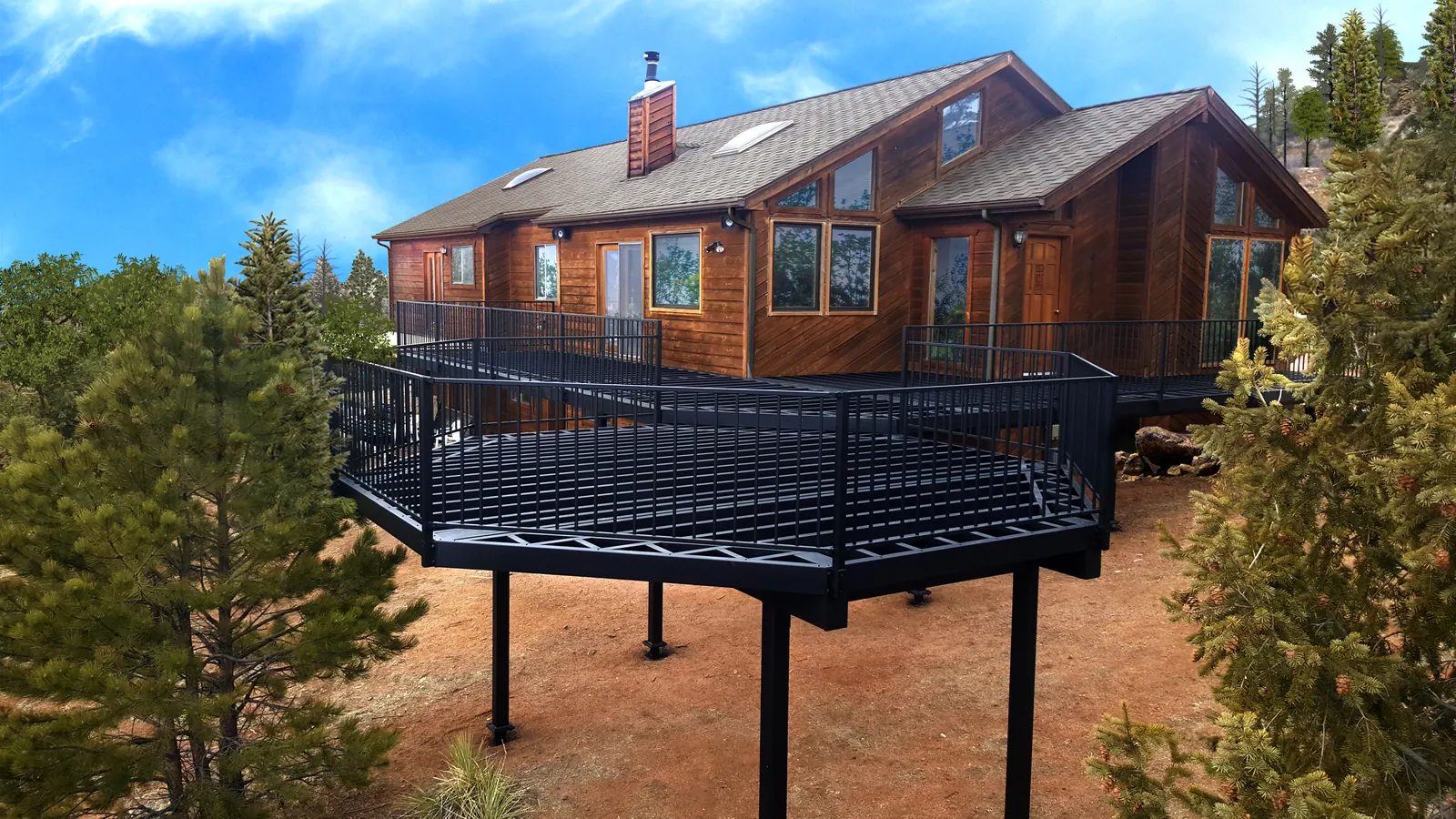 Steel-framed deck wrapping a cedar home