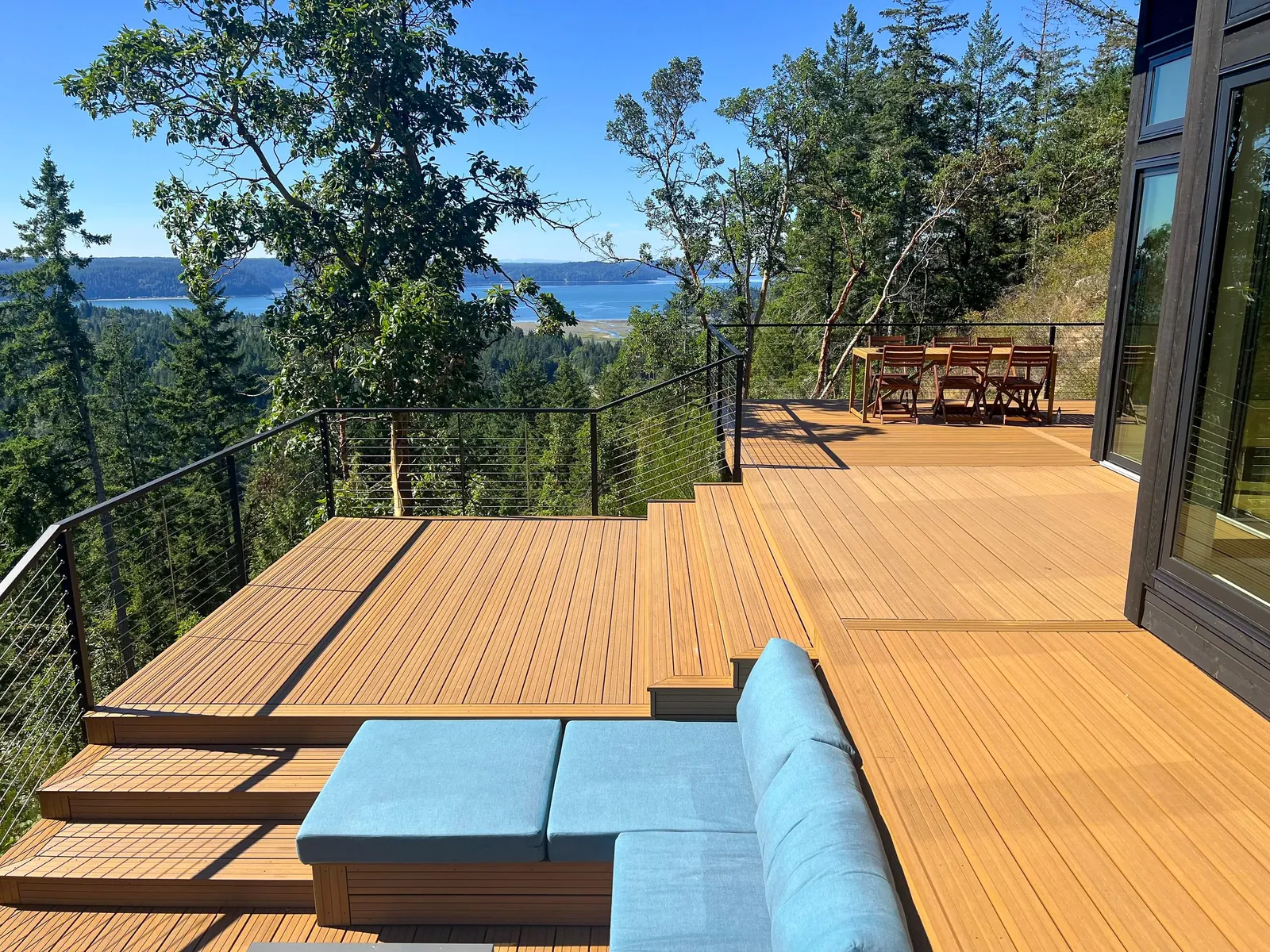 Stepped deck with built-in seating above the water