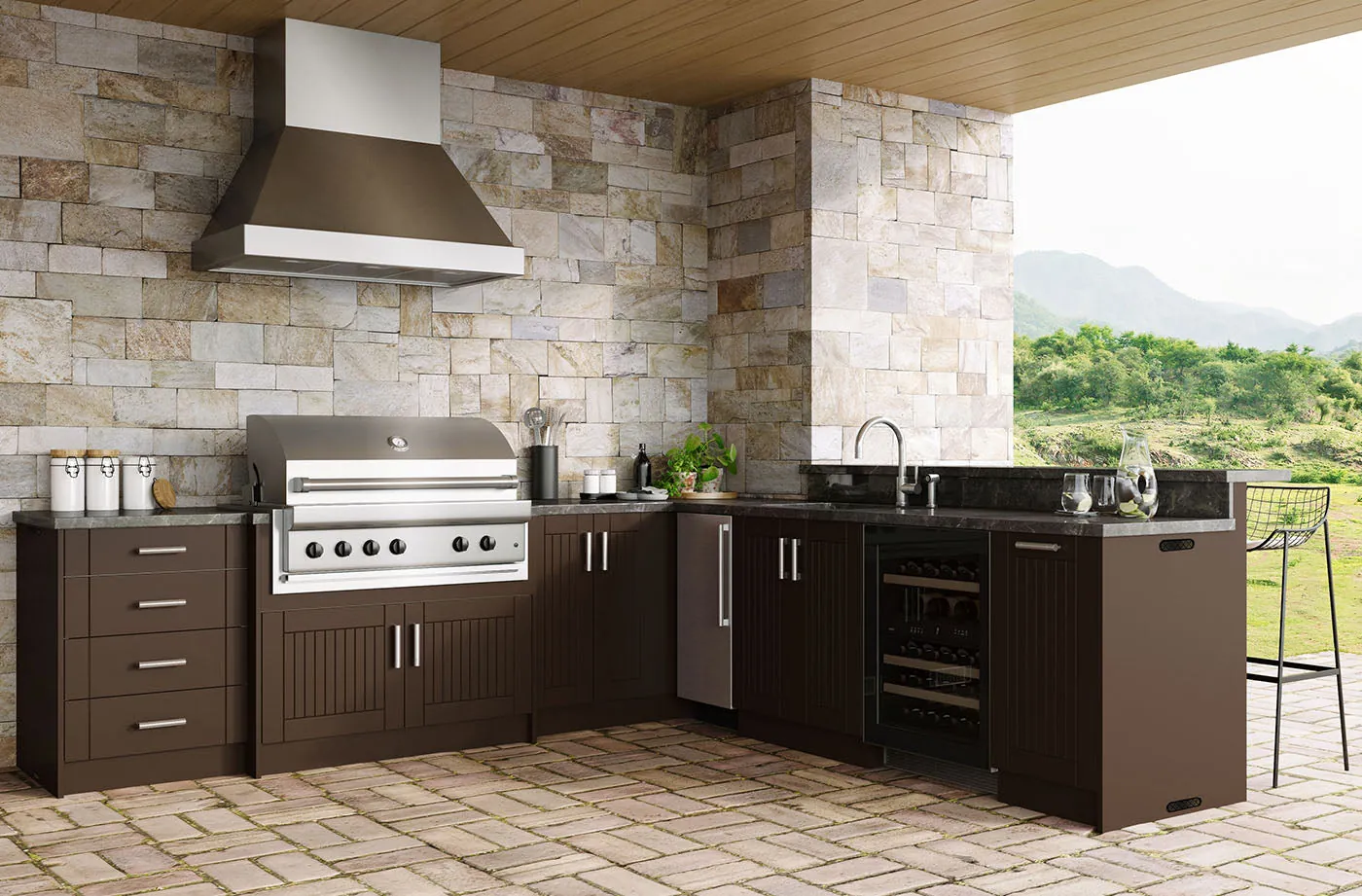 Outdoor kitchen with a stone hood wall