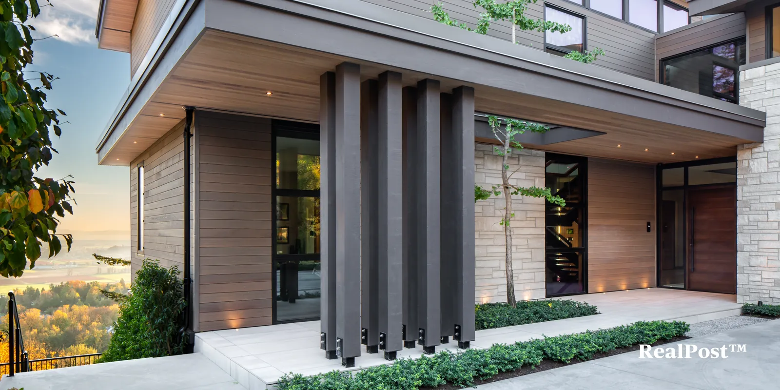 Modern entry with wood-look posts and soffit