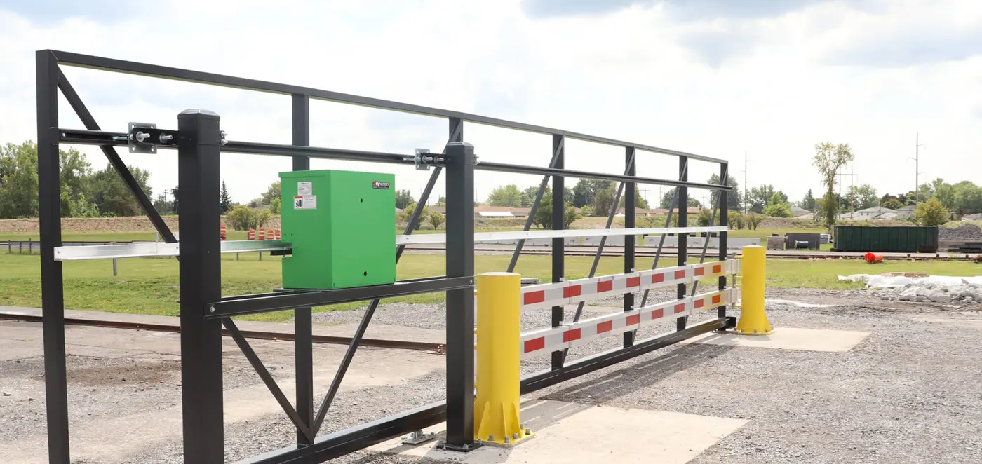 Commercial slide gate operator - slide gate operator installed on a sliding gate, HySecurity