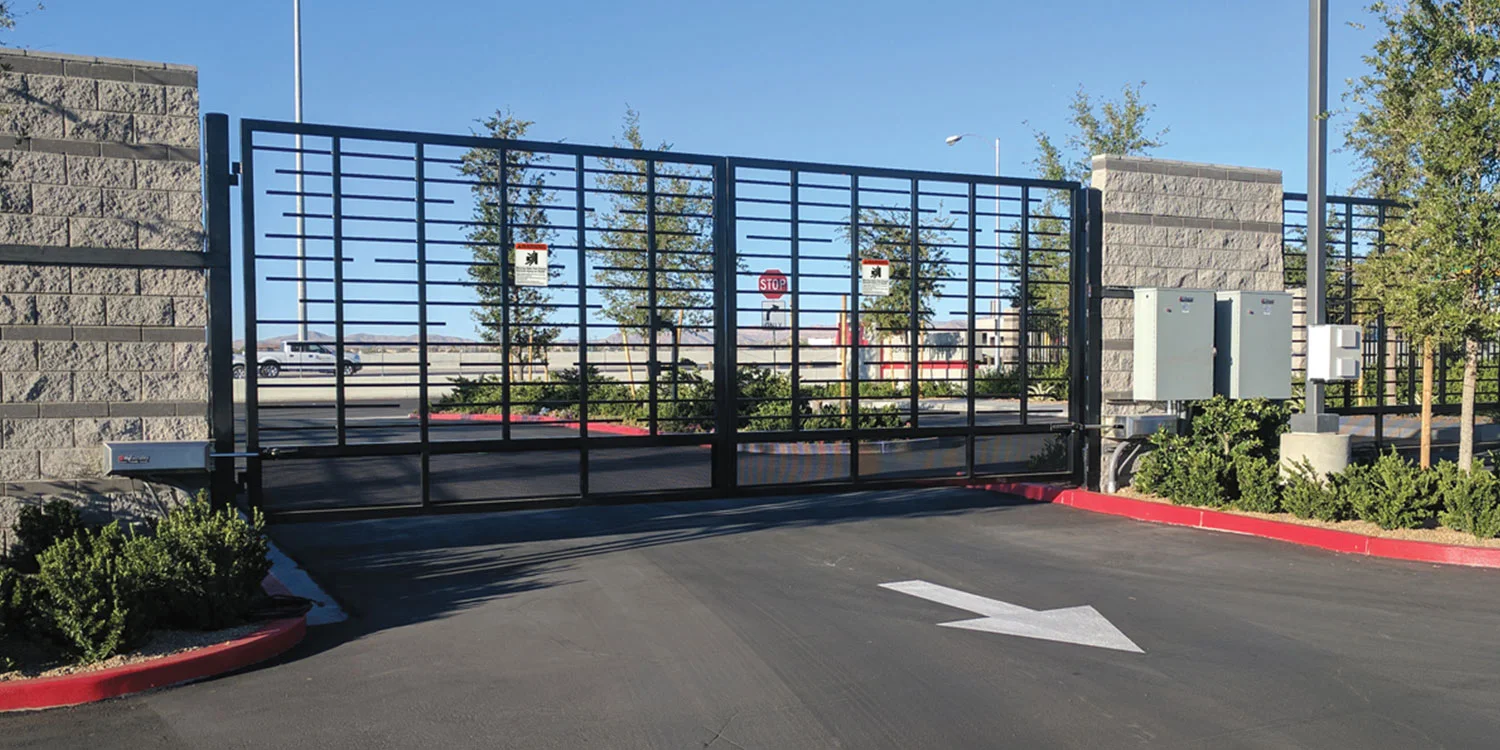 HySecurity HydraSwing hydraulic swing gate operator on a commercial gate