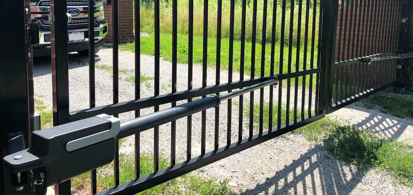Commercial swing gate operator - swing gate operator installed on a swing gate, HySecurity