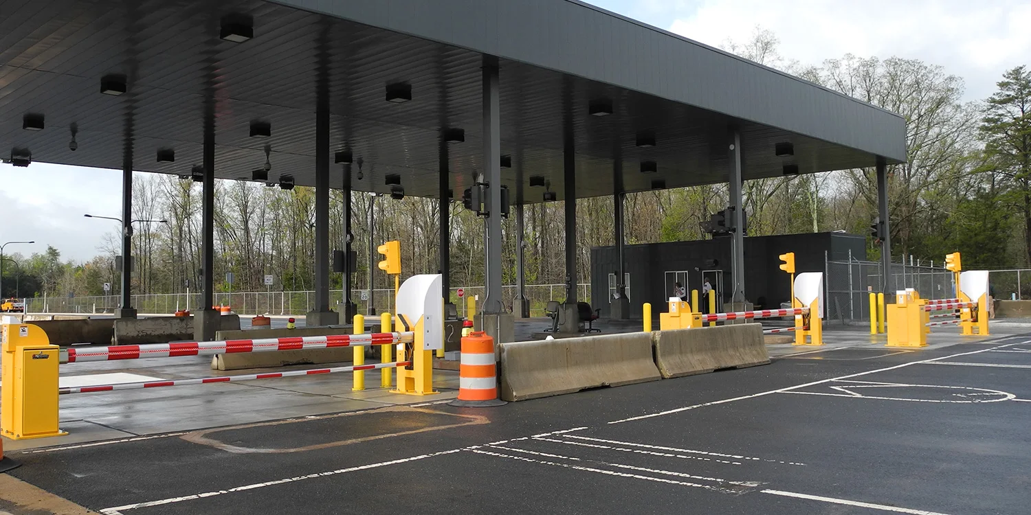 HySecurity StrongArm crash-rated barrier arm at a secured entrance