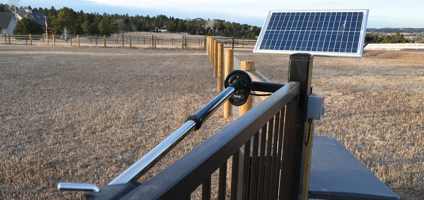 Commercial swing gate operator - swing gate operator installed on a swing gate, HySecurity