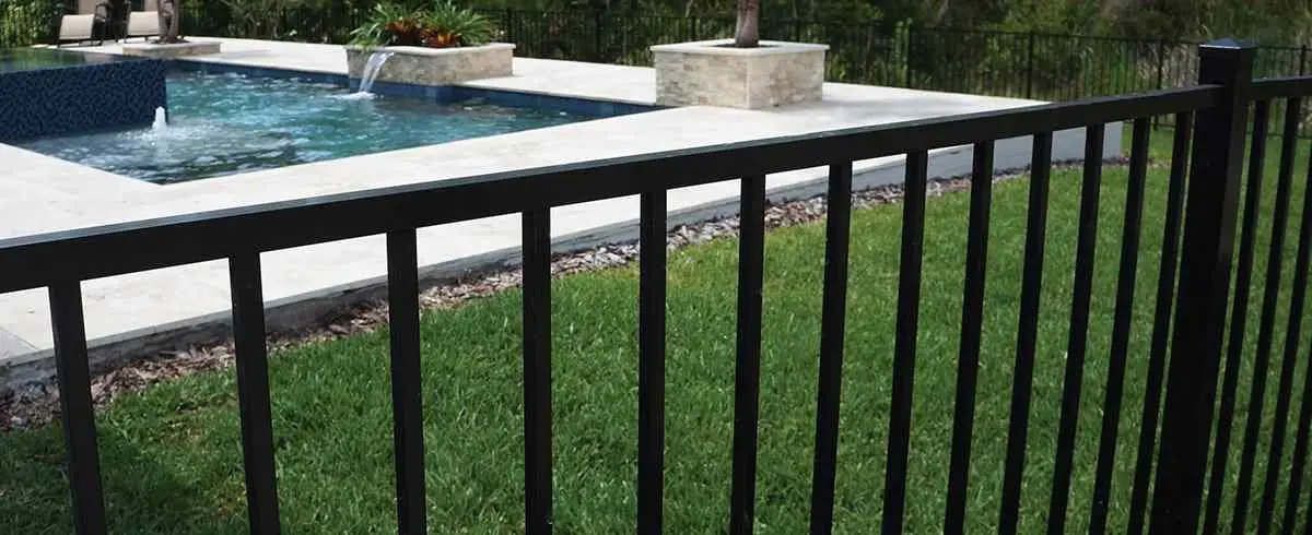 Independence aluminum fence beside a backyard pool