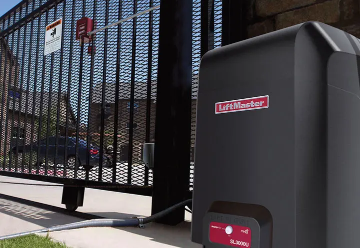LiftMaster slide gate operator installed beside an ornamental slide gate