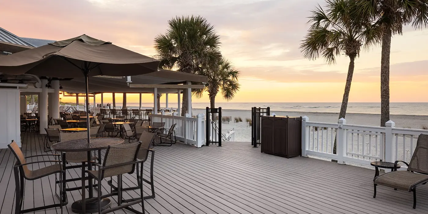 MoistureShield composite deck with white railing at a waterfront restaurant