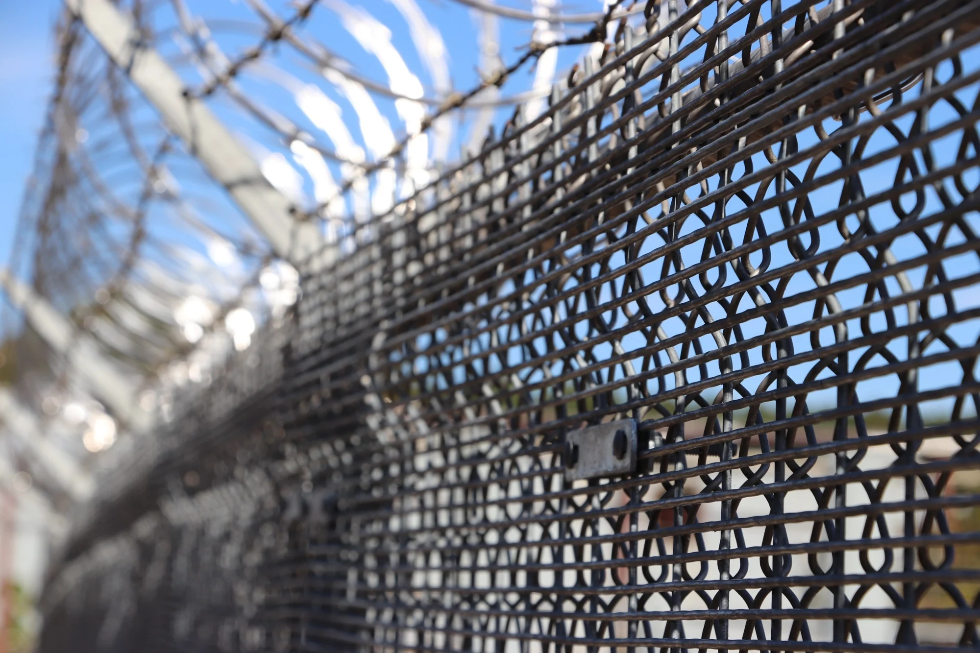 Close view of FortiLink mesh over chain link