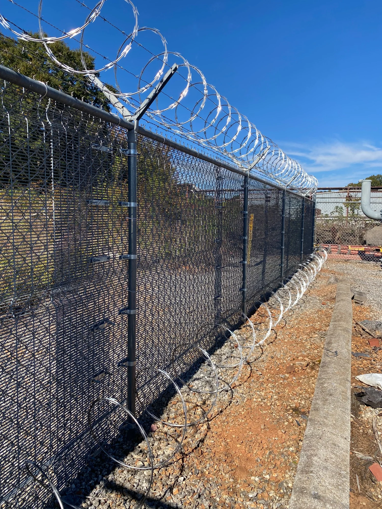 FortiLink retrofit along a chain link perimeter