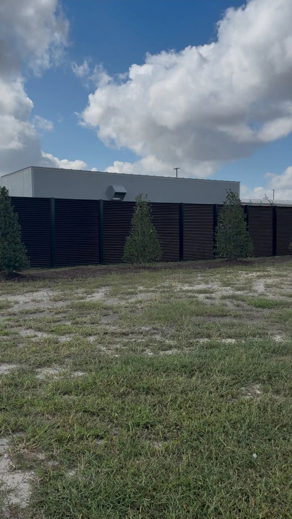 AirVeil black aluminum louver fence screen