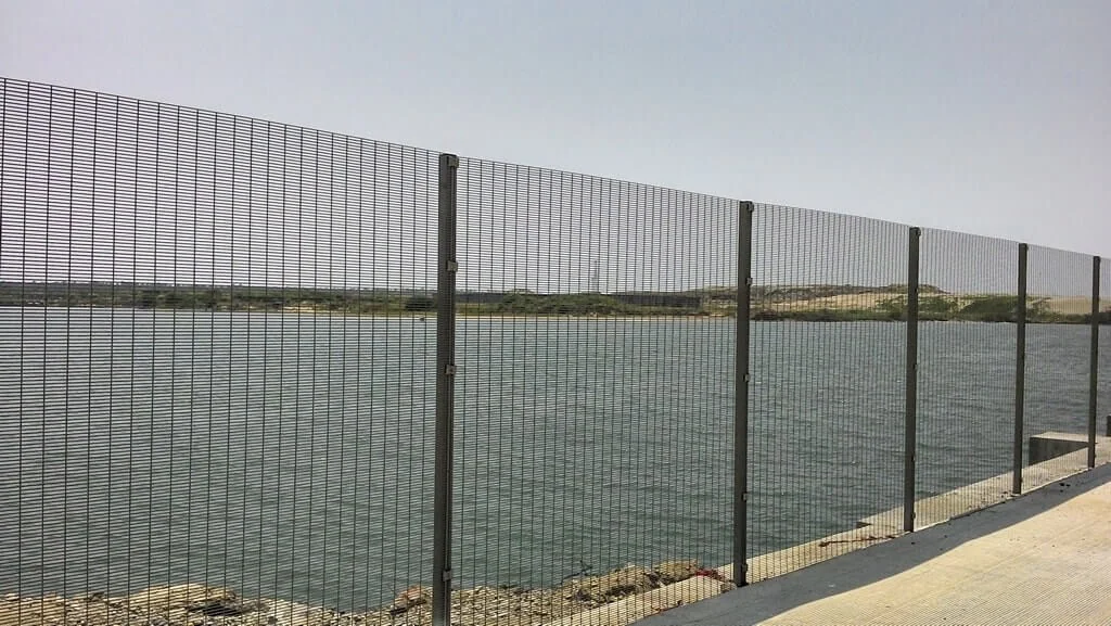 Forte anti-climb mesh fence beside a lake