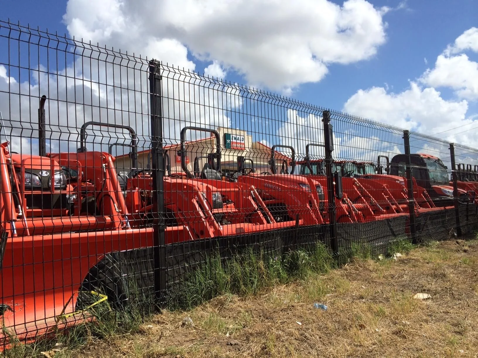 Black Designmaster fence securing an equipment yard