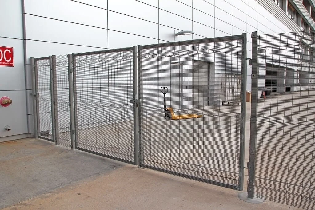 Forte mesh double swing gate at a building entry