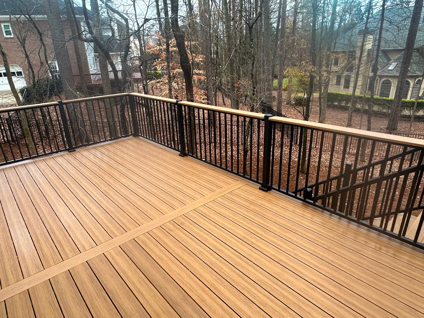 RailMaster aluminum railing on a tan composite deck