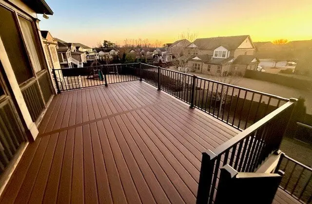 RailMaster aluminum railing on a deck at sunset