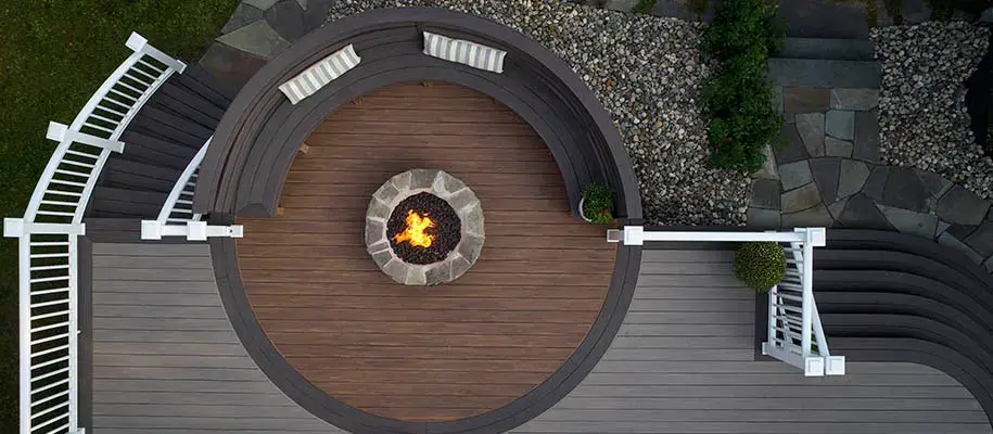 Aerial view of a TimberTech deck around a fire pit
